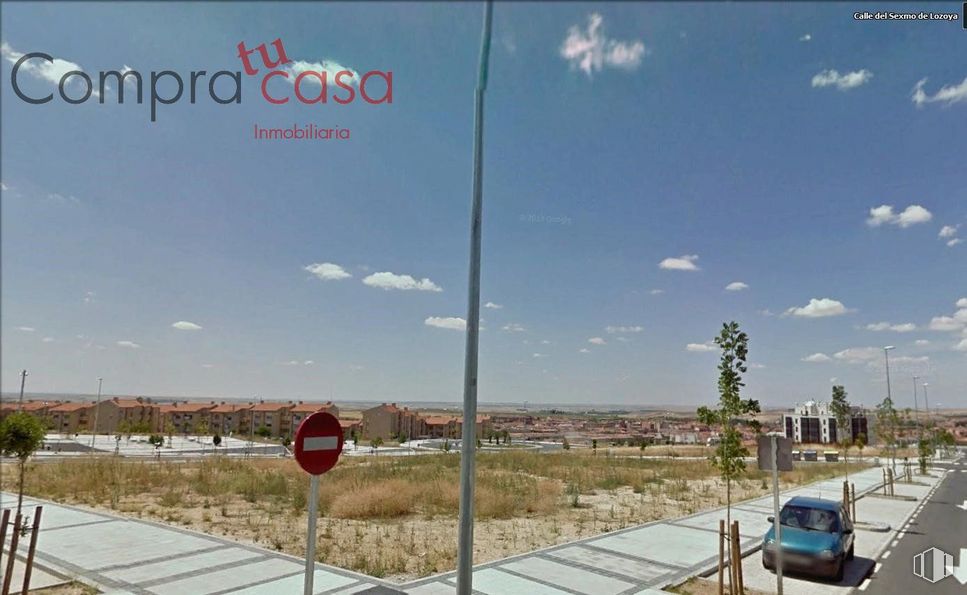 Land for sale at Plaza de Toros, Segovia, 40005 with car, cloud, sky, plant, natural environment, road surface, land lot, asphalt, line and landscape around