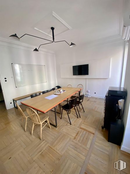 Office for rent at Calle Ferraz, Moncloa - Aravaca, Madrid, 28008 with chair, lighting, light fixture, table, kitchen & dining room table, furniture, flooring, interior design, floor and wall around