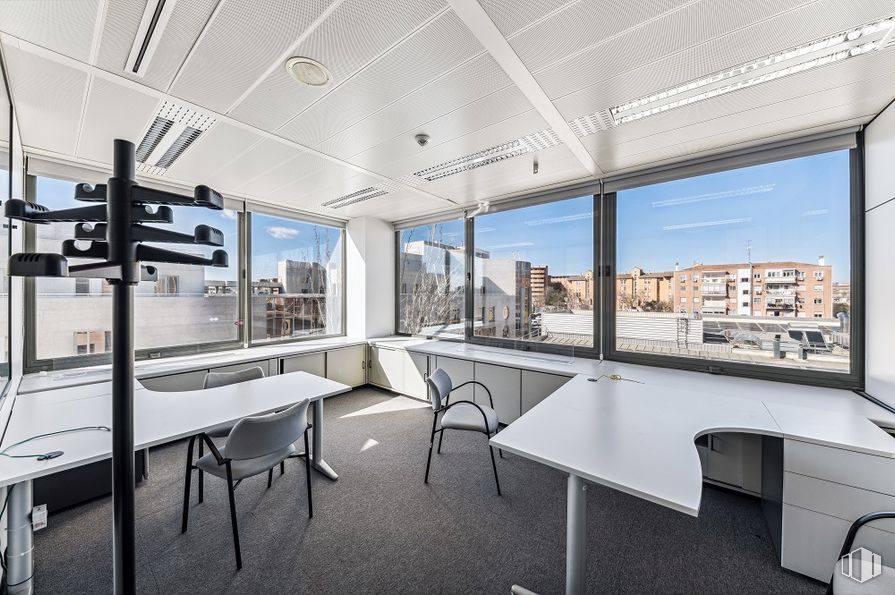 Office for rent at Calle Orduña, 2, Fuencarral - El Pardo, Madrid, 28034 with chair, lighting, building, table, furniture, window, kitchen, interior design, shade and flooring around