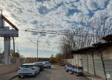 Land for sale at Colonia Llorente, San Blas - Canillejas, Madrid, 28022 with car, street light, automotive lighting, automotive parking light, automotive mirror, windshield, electricity, family car, automotive side-view mirror and automotive tail & brake light around