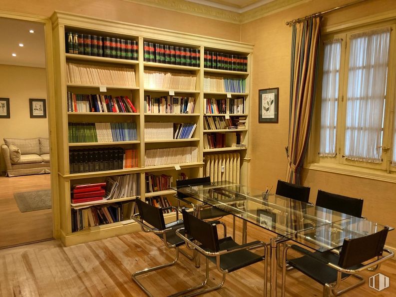 Office for rent at Calle Velázquez, 114, Salamanca, Madrid, 28006 with bookcase, chair, window, table, kitchen & dining room table, furniture, shelf, shelving, flooring and interior design around