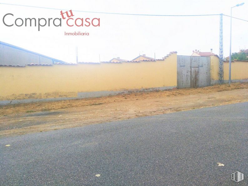 Land for sale at Zona Zamarramala, Segovia, 40196 with sky, road surface, asphalt, land lot, tar, thoroughfare, grass, rolling, motor vehicle and landscape around