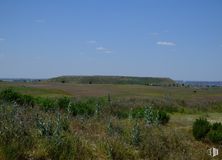 Land for sale at Polígono UZP0301 Valdecarros, Villa de Vallecas, Madrid, 28051 with sky, plant, cloud, natural landscape, grass, grassland, landscape, horizon, prairie and herbaceous plant around