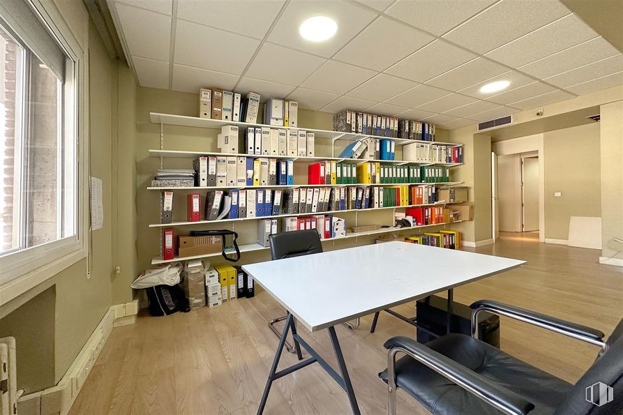 Office for rent at Avenida América, Salamanca, Madrid, 28002 with chair, desk, window, table, bookcase, furniture, shelf, shelving, flooring and interior design around