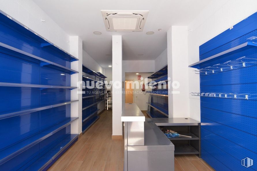 Retail for sale at Calle Jabonería, Alcorcón, Madrid, 28921 with lighting, cabinetry, blue, building, shelf, interior design, shelving, flooring, floor and wood around