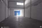 Industrial for rent at Calle Luis I, Villa de Vallecas, Madrid, 28031 with window, building, fixture, hall, flooring, symmetry, ceiling, space, concrete and electric blue around