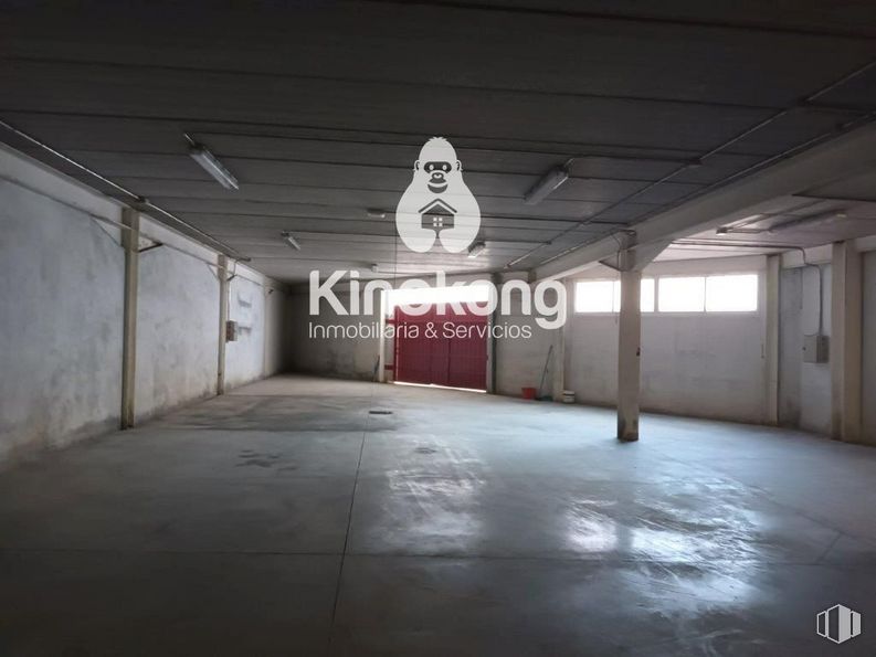 Industrial for sale at Zona industrial, Campo Real, Madrid, 28510 with door, window, tints and shades, gas, city, concrete, flooring, asphalt, darkness and font around