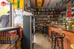 Retail for rent at Calle Torregrosa, Hortaleza, Madrid, 28043 with stool, top, person, clothing, shelf, bottle, shelving, alcoholic drink, convenience store and liquor around