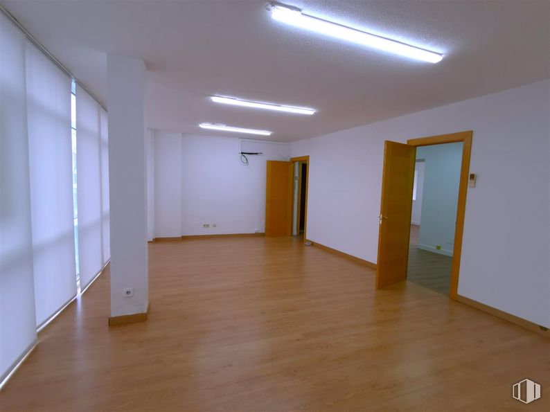 Office for rent at Calle Gran Vía, 28, Majadahonda, Madrid, 28220 with light fixture, lighting, door, floor, flooring, wood flooring, wall, wood, ceiling and laminate flooring around