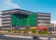 Office for rent at Calle Ribera del Loira, 20-22, Barajas, Madrid, 28033 with building, sky, daytime, infrastructure, plant, architecture, tower block, urban design, car and cloud around