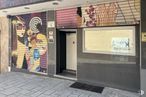 Retail for sale at Calle Camino Vinateros, Moratalaz, Madrid, 28030 with building, door, art, sidewalk, graffiti, tints and shades, facade, road, road surface and house around