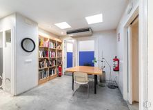 Office for rent at Calle Claudio Coello, Salamanca, Madrid, 28001 with chair, bookcase, desk, light fixture, lighting, table, furniture, shelf, wood and building around