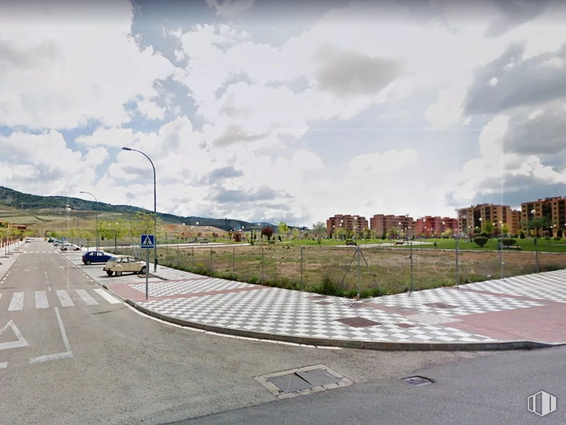 Land for sale at Zona centro, Cuenca, 16004 with cloud, sky, street light, plant, infrastructure, road surface, asphalt, land lot, building and urban design around