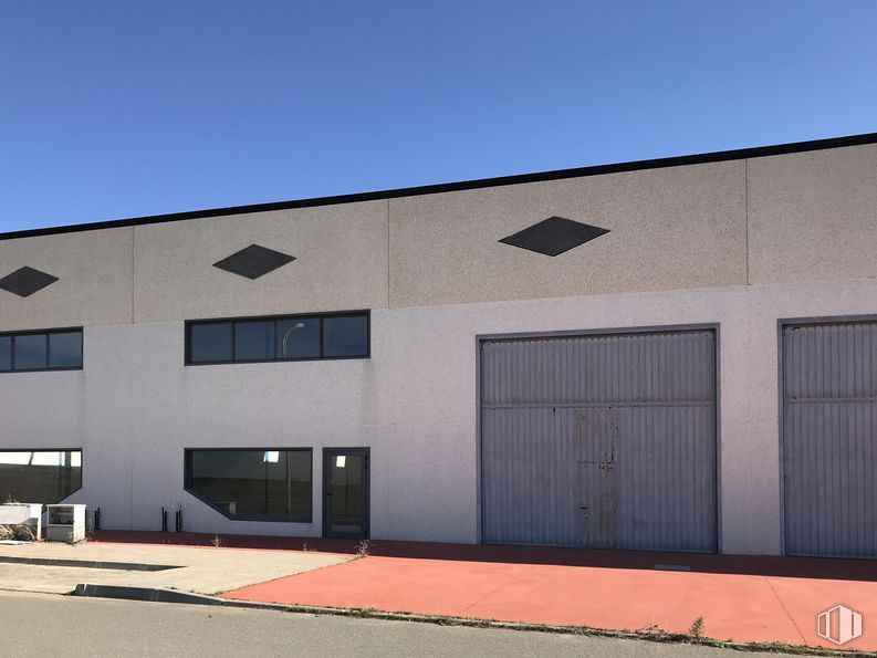 Industrial for sale at Terreno Sector 4, 80, Barcience, Toledo, 45525 with window, building, door, sky, shade, asphalt, fixture, rectangle, residential area and road surface around