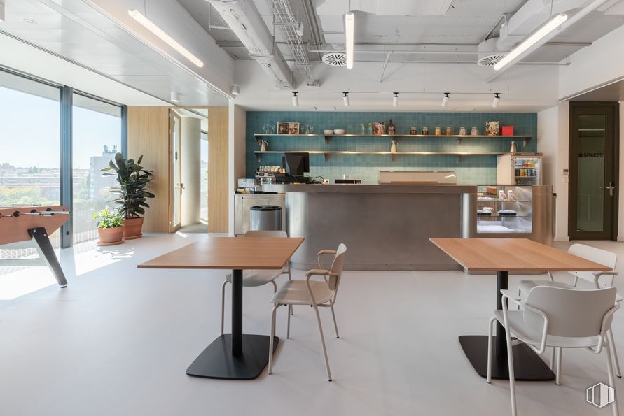 Office for rent at Edificio Helios, Spaces Campo Naciones, Hortaleza, Madrid, 28033 with table, chair, houseplant, lighting, furniture, building, wood, countertop, house and kitchen around