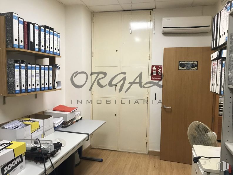 Retail for sale at Calle Galicia, Argés, Toledo, 45122 with bookcase, luggage & bags, furniture, building, table, chair, interior design, architecture, wood and flooring around