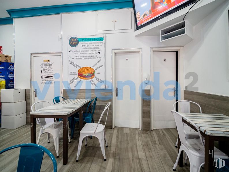 Retail for sale at Calle Arcos, San Blas - Canillejas, Madrid, 28032 with door, kitchen & dining room table, chair, table, furniture, property, product, azure, building and interior design around