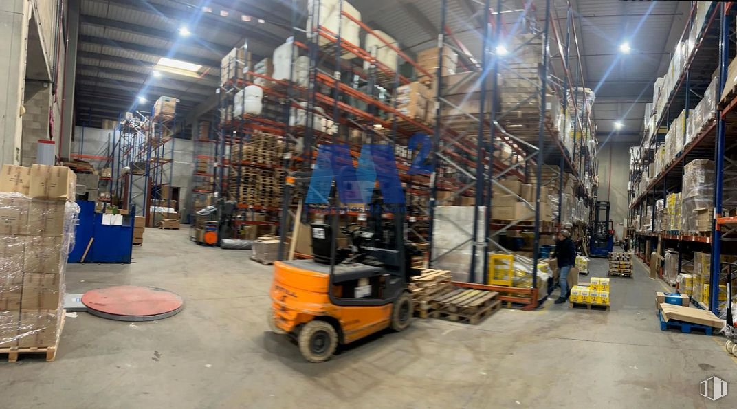 Industrial for rent at Polígono de Madrid, San Fernando de Henares, Madrid, 28830 with person, wheel, tire, warehouse, floor, inventory, industry, forklift, engineering and metal around