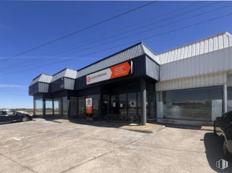 Industrial for sale at Carretera Navahermosa, Guadamur, Toledo, 45160 with car, sky, automotive parking light, tire, automotive tire, wheel, building, asphalt, facade and commercial building around