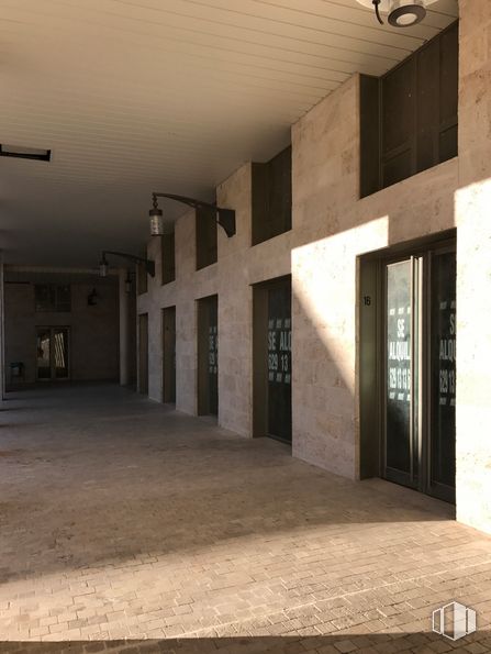 Retail for sale & for rent at Plaza Nueva de Noblejas, Noblejas, Toledo, 45350 with door, property, daytime, fixture, interior design, flooring, floor, hall, shade and material property around