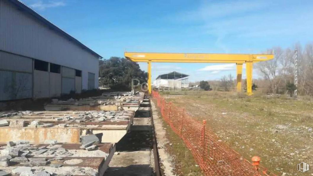 Industrial for sale at Zona Industrial, Torrejón del Rey, Guadalajara, 19174 with building, sky, cloud, plant, road surface, land lot, asphalt, shade, tree and rural area around