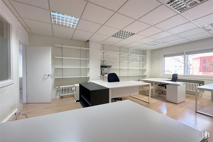 Office for rent at Avenida América, Salamanca, Madrid, 28002 with door, desk, table top, lighting, furniture, interior design, flooring, wall, ceiling and floor around