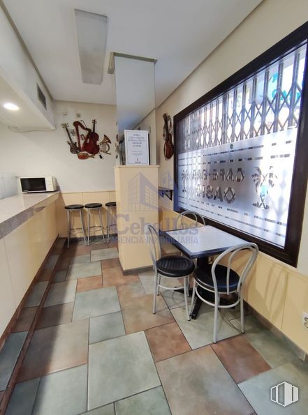 Retail for sale at Calle Ferial, Guadalajara, 19002 with chair, property, interior design, architecture, flooring, table, tile flooring, floor, wood and wall around