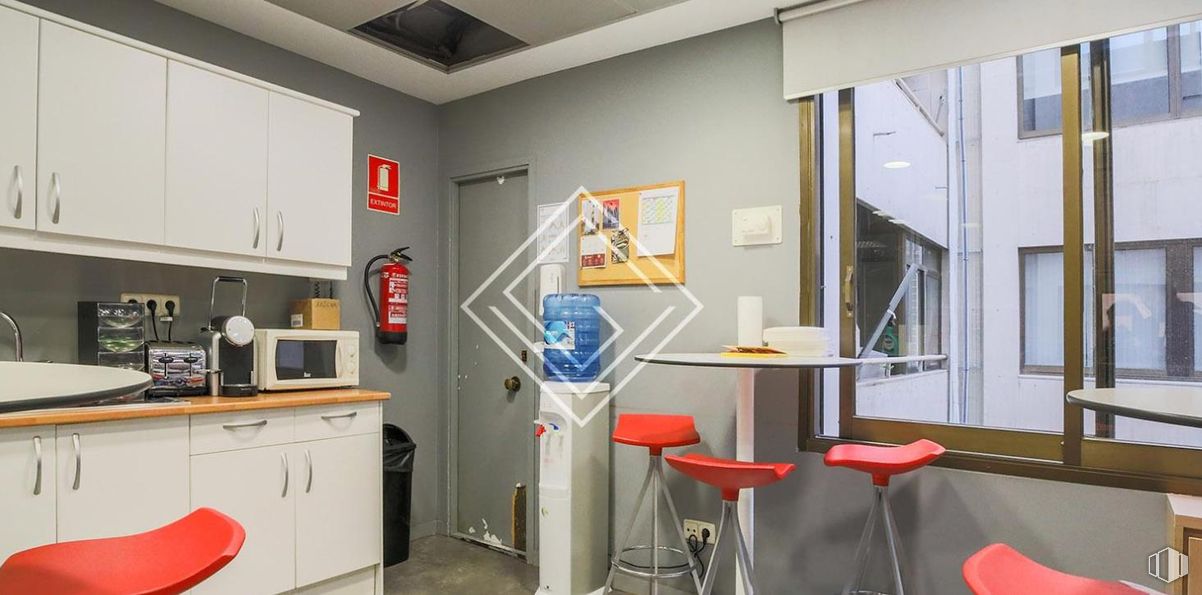 Office for rent at Calle Orense, Tetuán, Madrid, 28020 with microwave oven, stool, cabinetry, cupboard, interior design, furniture, ceiling, flooring, lighting and room around