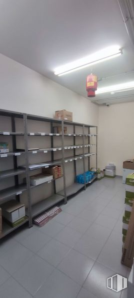 Industrial for rent at Polígono Vicolozano, Ávila, 05194 with lighting, light fixture, furniture, shelf, building, shelving, interior design, floor, flooring and bookcase around