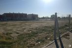 Land for sale at P.I. El Gato, Villaverde, Madrid, 28021 with building, sky, ecoregion, land lot, sunlight, horizon, landscape, plain, fence and grass around