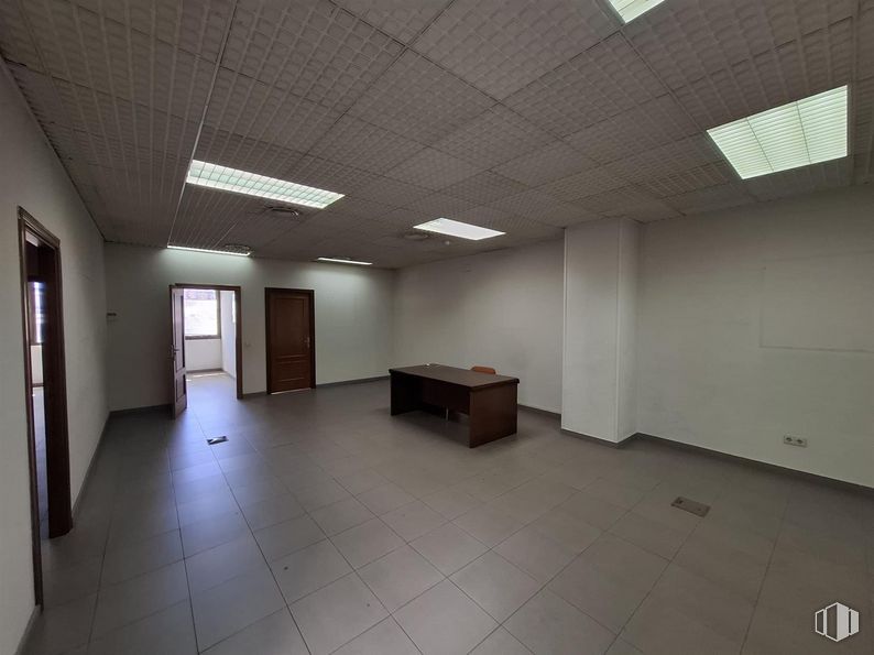 Office for rent at Avenida General Villalba, Toledo, 45003 with light fixture, lighting, desk, hall, interior design, fixture, floor, flooring, ceiling and space around