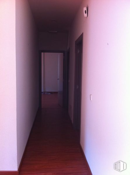 Office for rent at Avenida Acueducto, Segovia, 40001 with door, fixture, building, purple, violet, floor, flooring, wood, magenta and paint around