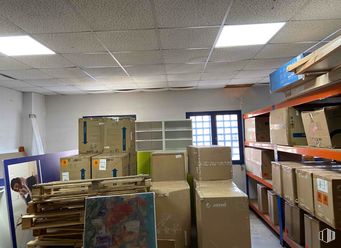 Industrial for sale at Zona industrial, San Sebastián de los Reyes, Madrid, 28700 with shipping box, box, light fixture, ceiling, flooring, interior design, floor, lighting, cardboard packaging and shelving around