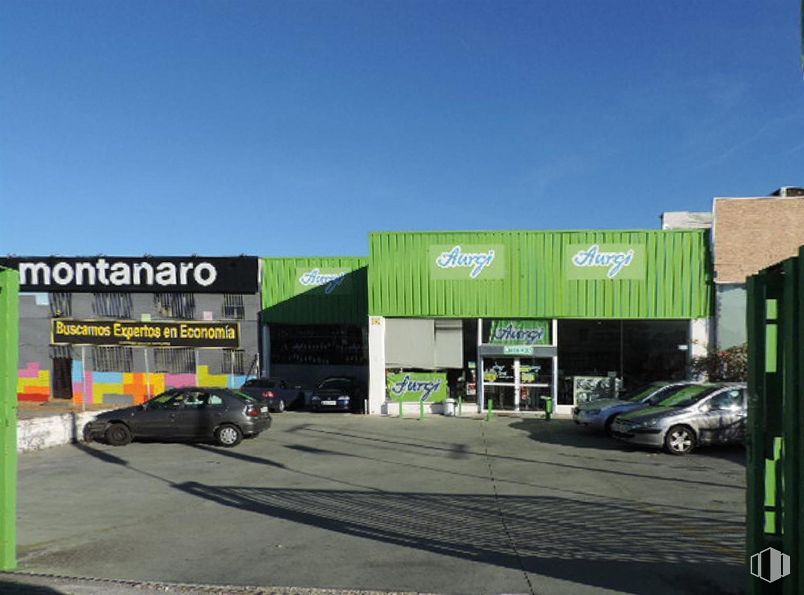 Industrial for sale at Avenida Madrid, Arganda del Rey, Madrid, 28500 with car, building, automotive parking light, sky, tire, wheel, motor vehicle, vehicle, automotive tire and asphalt around