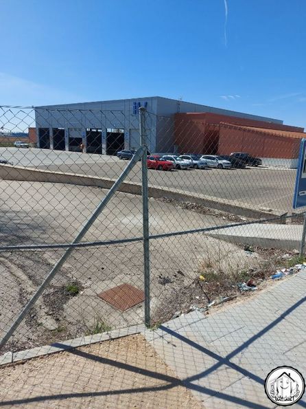 Industrial for sale at Camino Ciempozuelos, Seseña, Toledo, 45224 with sky, tire, fence, mesh, wheel, wire fencing, composite material, road surface, gas and home fencing around