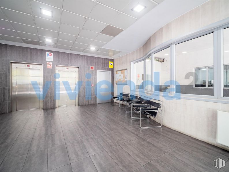 Retail for sale at Calle San Romualdo, San Blas - Canillejas, Madrid, 28037 with door, chair, interior design, flooring, floor, hall, building, wall, houseplant and ceiling around