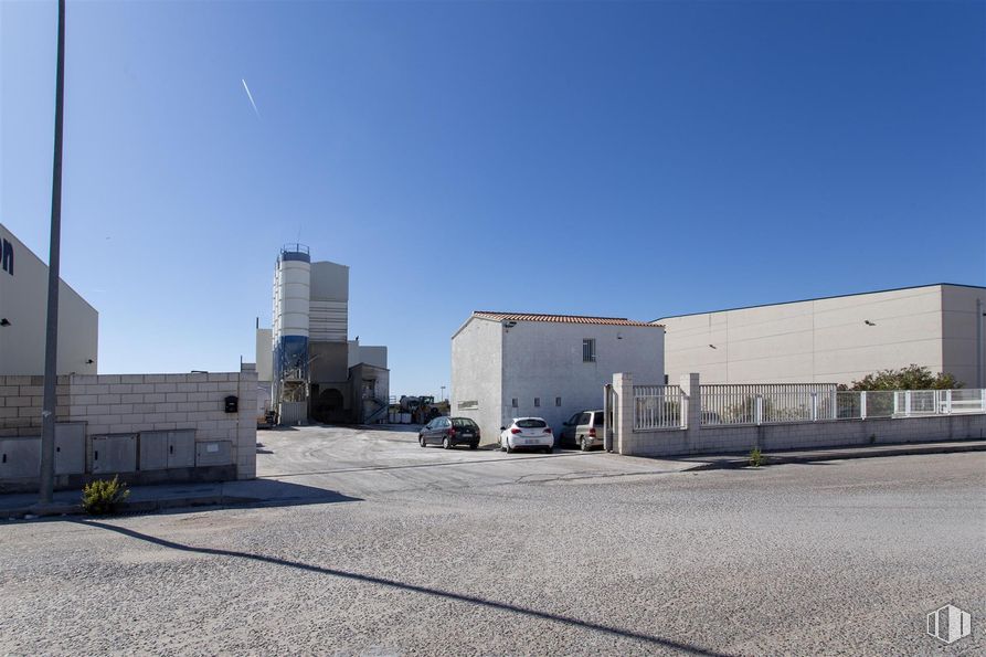 Industrial for sale at Calle Aluminio, Campo Real, Madrid, 28510 with car, building, asphalt, composite material, urban design, public utility, concrete, electricity, engineering and electrical supply around