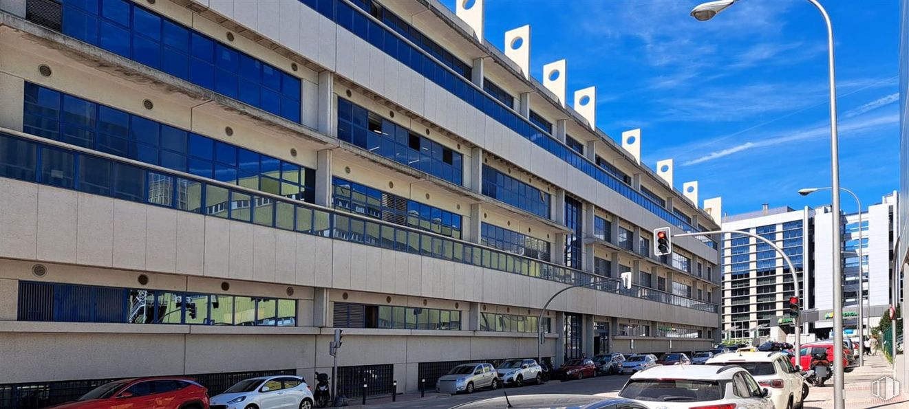 Industrial for sale at Calle Vía de los Poblados, Hortaleza, Madrid, 28033 with car, building, street light, cloud, vehicle, sky, wheel, urban design, window and parking around