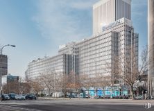 Office for rent at Edificio Cadagua, Paseo Castellana, 93, Tetuán, Madrid, 28046 with building, sky, skyscraper, daytime, cloud, tree, infrastructure, urban design, tower block and condominium around