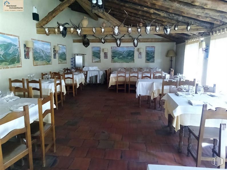 Retail for sale at Zona Collado Hermoso, Collado Hermoso, Segovia, 40170 with chair, table, kitchen & dining room table, picture frame, furniture, decoration, building, tablecloth, function hall and event around