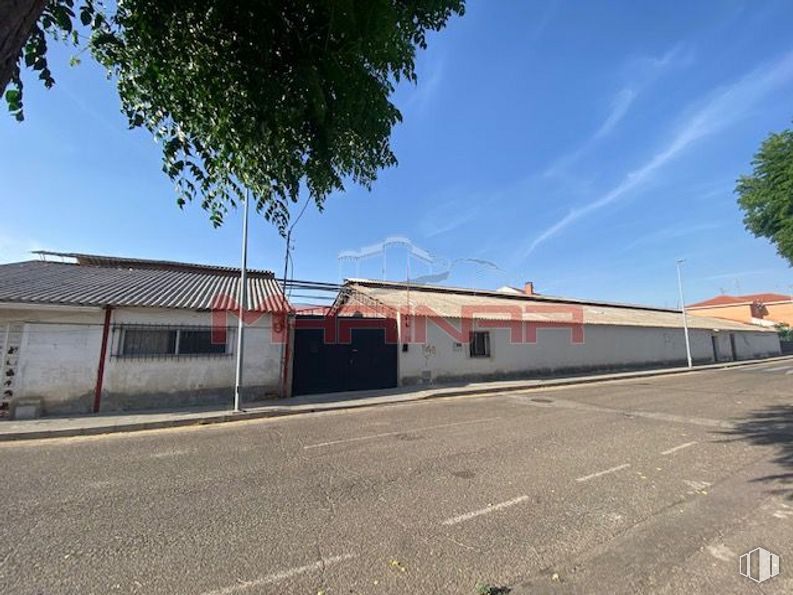 Industrial for sale at Calle San Roque, Esquivias, Toledo, 45221 with sky, road surface, asphalt, tree, shade, plant, window, cloud, facade and tints and shades around