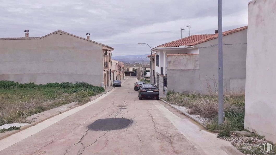 Land for sale at Casco urbano, Los Yébenes, Toledo, 45470 with plant, sky, car, cloud, building, vehicle, road surface, asphalt, land lot and house around