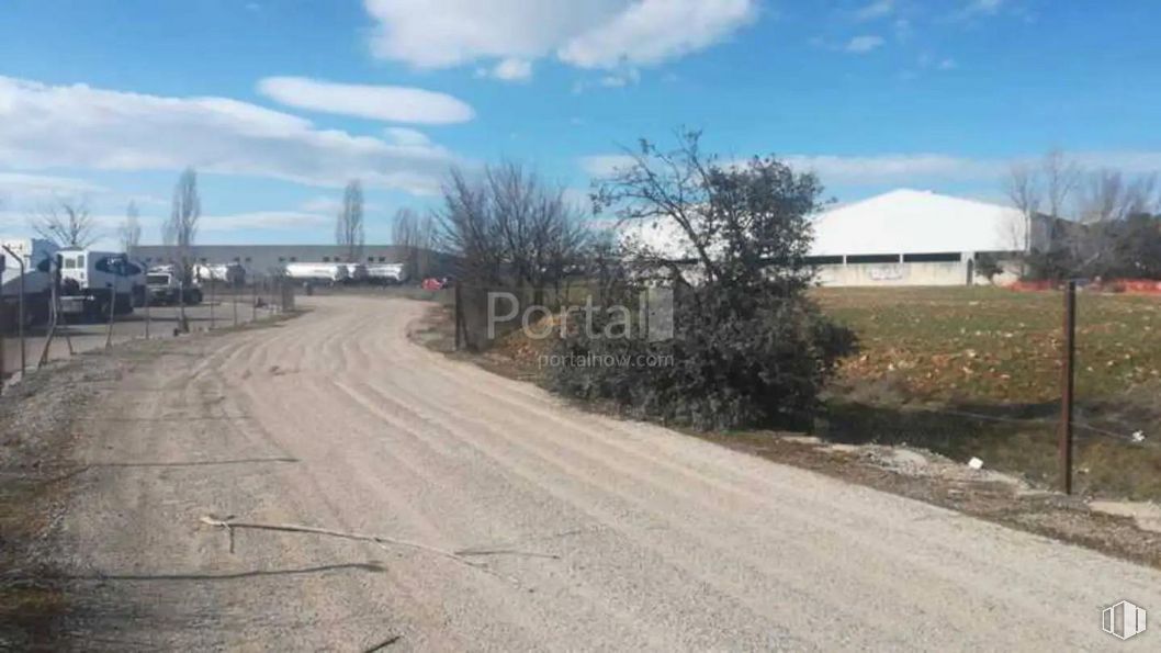 Industrial for sale at Zona Industrial, Torrejón del Rey, Guadalajara, 19174 with cloud, sky, plant, road surface, tree, asphalt, land lot, thoroughfare, residential area and landscape around