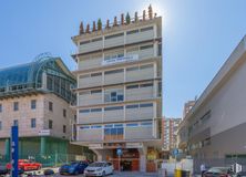 Office for rent at Calle Manuel Tovar, Fuencarral - El Pardo, Madrid, 28034 with building, tire, wheel, land vehicle, sky, car, blue, street light, vehicle and condominium around