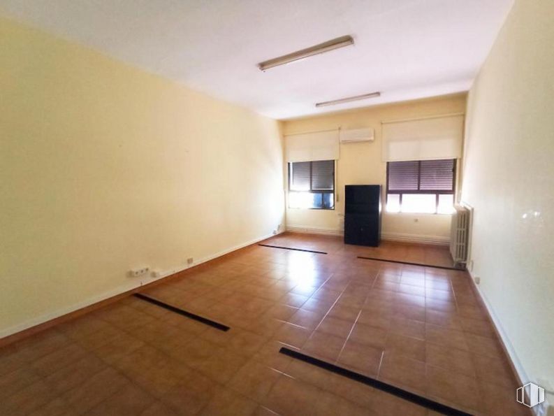 Office for rent at Carretera Capuchinos, Toledo, 45001 with window, lighting, wood, fixture, hall, flooring, floor, wood stain, hardwood and building around