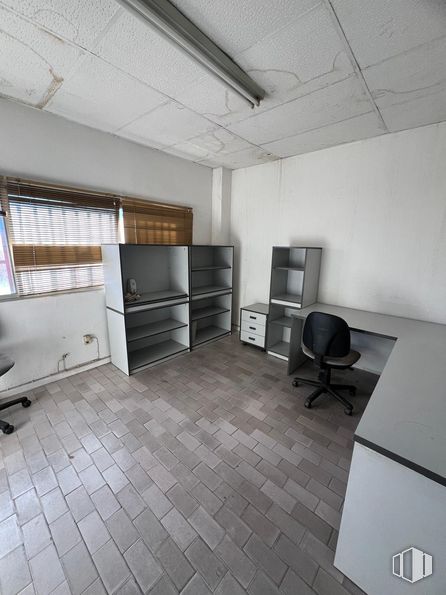 Industrial for sale at Calle Cabo de Tortosa, Arganda del Rey, Madrid, 28500 with chair, bookcase, furniture, flooring, floor, interior design, ceiling, lighting, composite material and room around