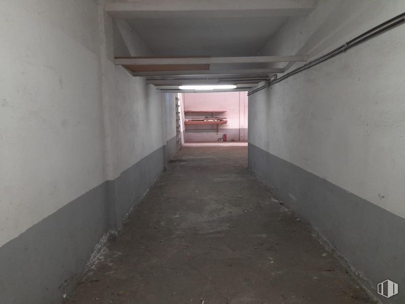 Industrial for sale at Calle Potasa, Villaverde, Madrid, 28021 with building, grey, fixture, composite material, road, symmetry, asphalt, concrete, ceiling and flooring around