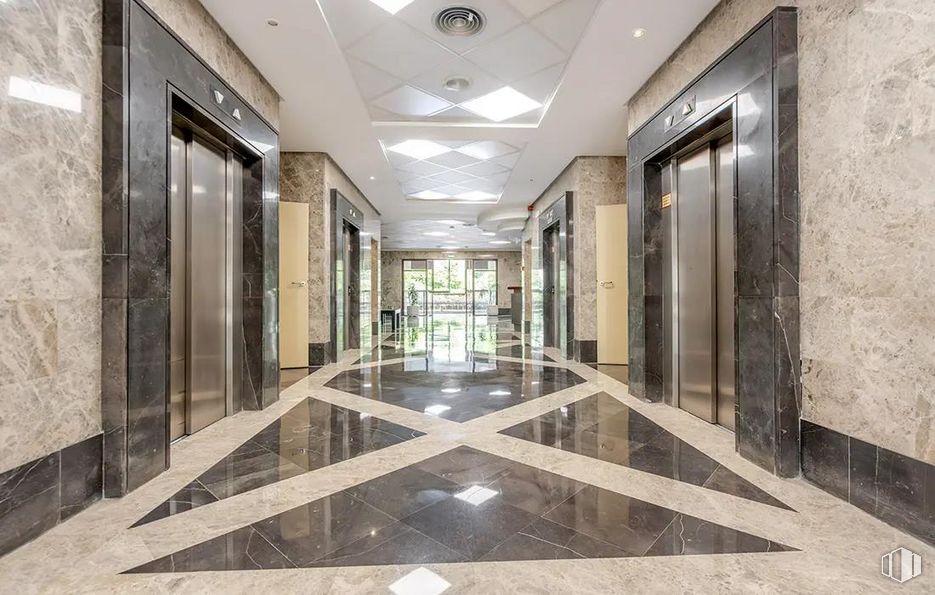 Office for sale at Calle Rosa Lima, Las Rozas de Madrid, Madrid, 28290 with fixture, wood, plant, door, lighting, interior design, building, flooring, floor and hall around