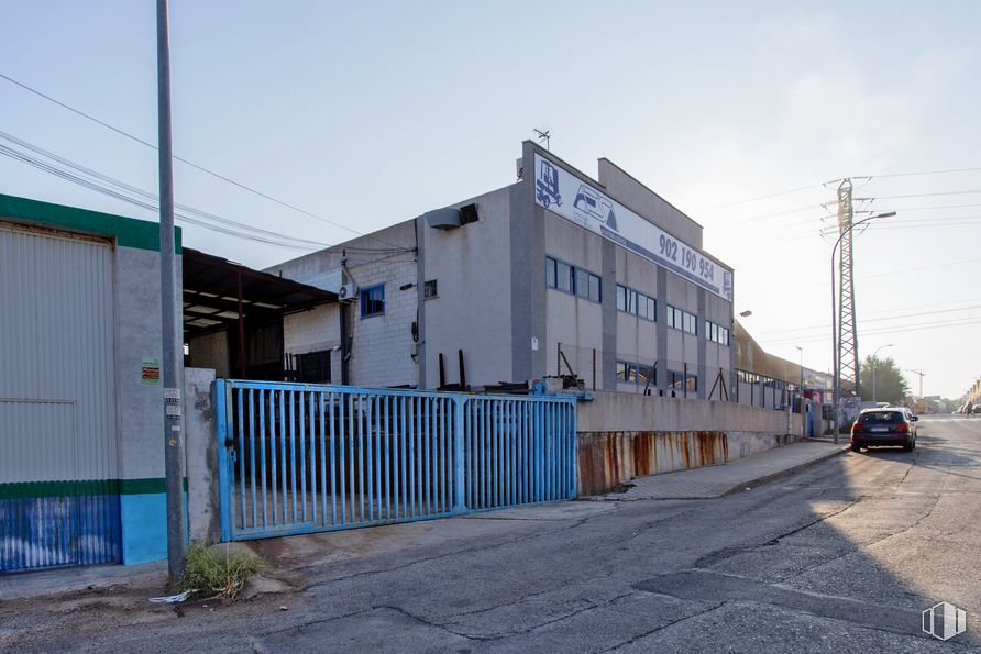 Nave en venta en Zona Industrial, Arganda del Rey, Madrid, 28500 con edificio, cielo, superficie de carretera, asfalto, lote de tierra, electricidad, diseño urbano, área residencial, carretera y fachada alrededor