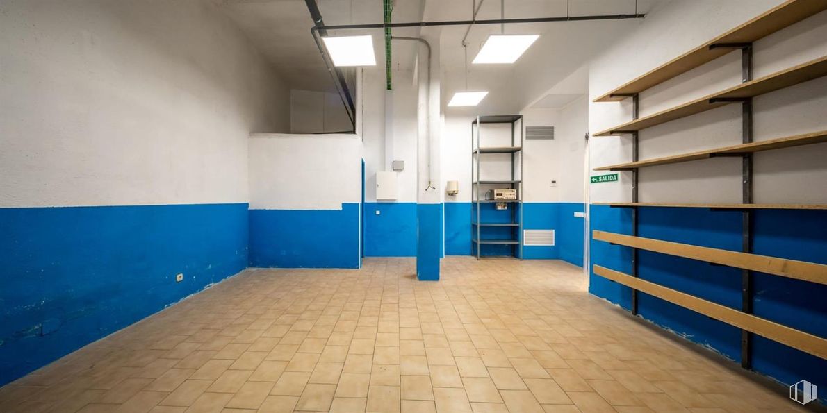 Retail for sale at Calle Mosquilona, Colmenar Viejo, Madrid, 28770 with bookcase, furniture, wall, flooring, floor, composite material, ceiling, paint, tile and steel around